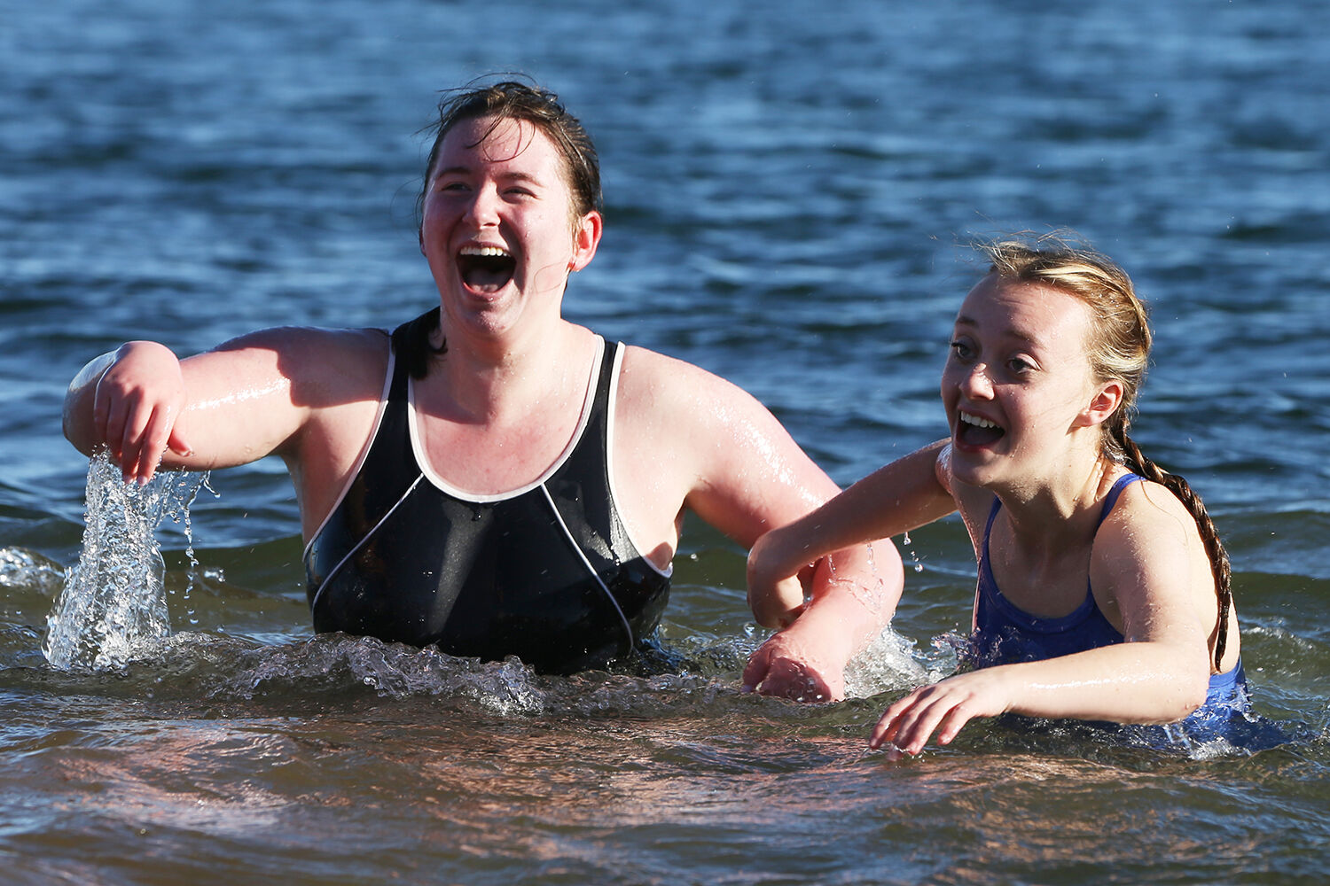 Elizabeth Siskin, left, laughs with friend Ryanne Dixon
